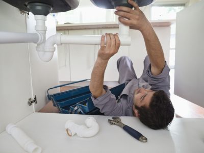 Plumber-kitchen-sink-GettyImages-169270359-58e16b1d3df78c5162ac0529-2